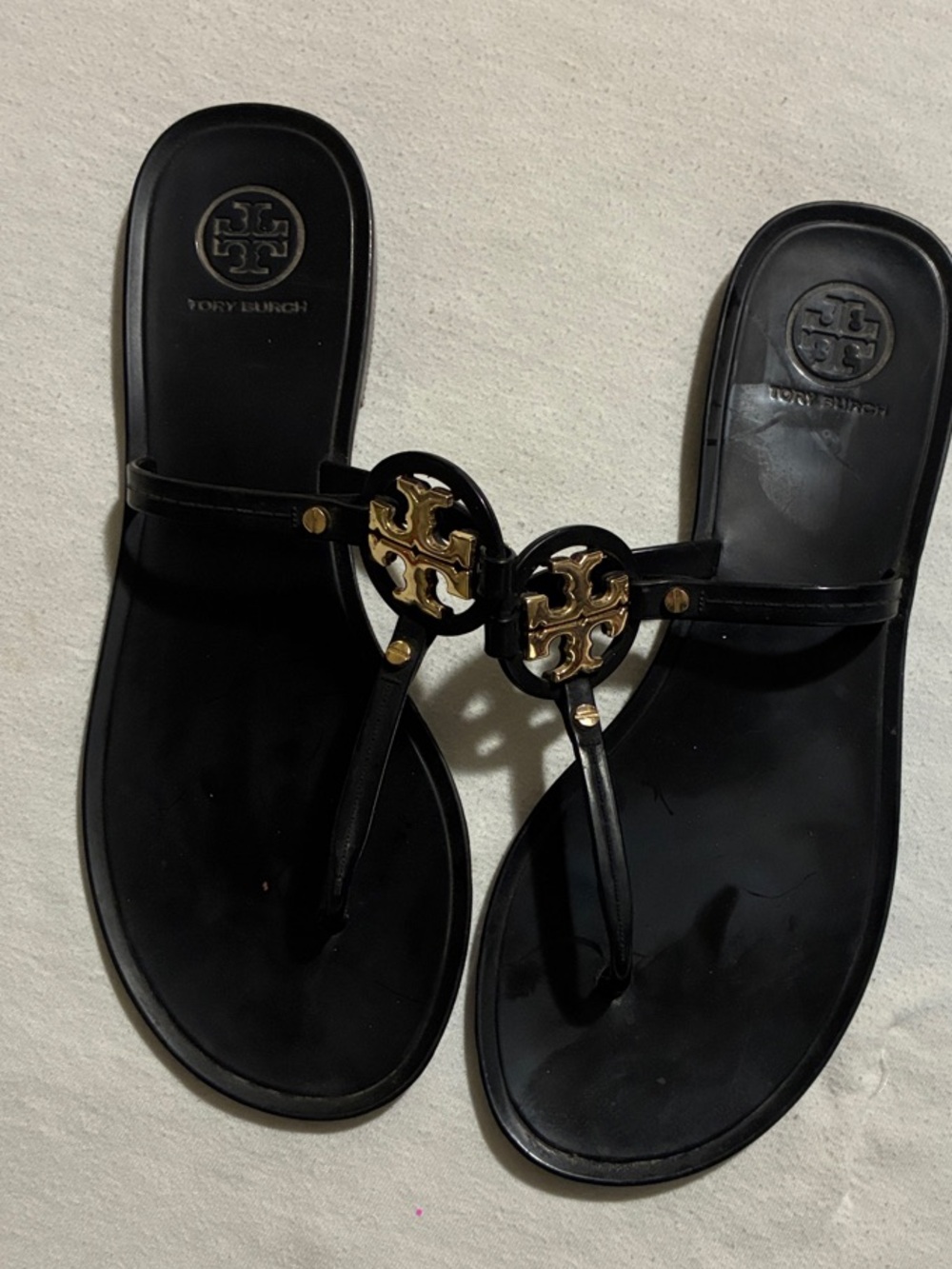 Tory Burch Black Thong Sandals with Gold Logo Medallions
